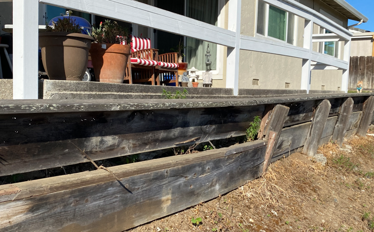 Inspection and repair of the Wood retaining wall
